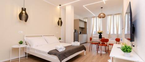 1 dormitori, planxa i posts de planxar, wifi i roba de llit