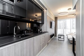 Classic Studio, Balcony | Private kitchenette | Coffee/tea maker, electric kettle