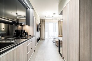 Classic Studio, Balcony | Private kitchenette | Coffee/tea maker, electric kettle