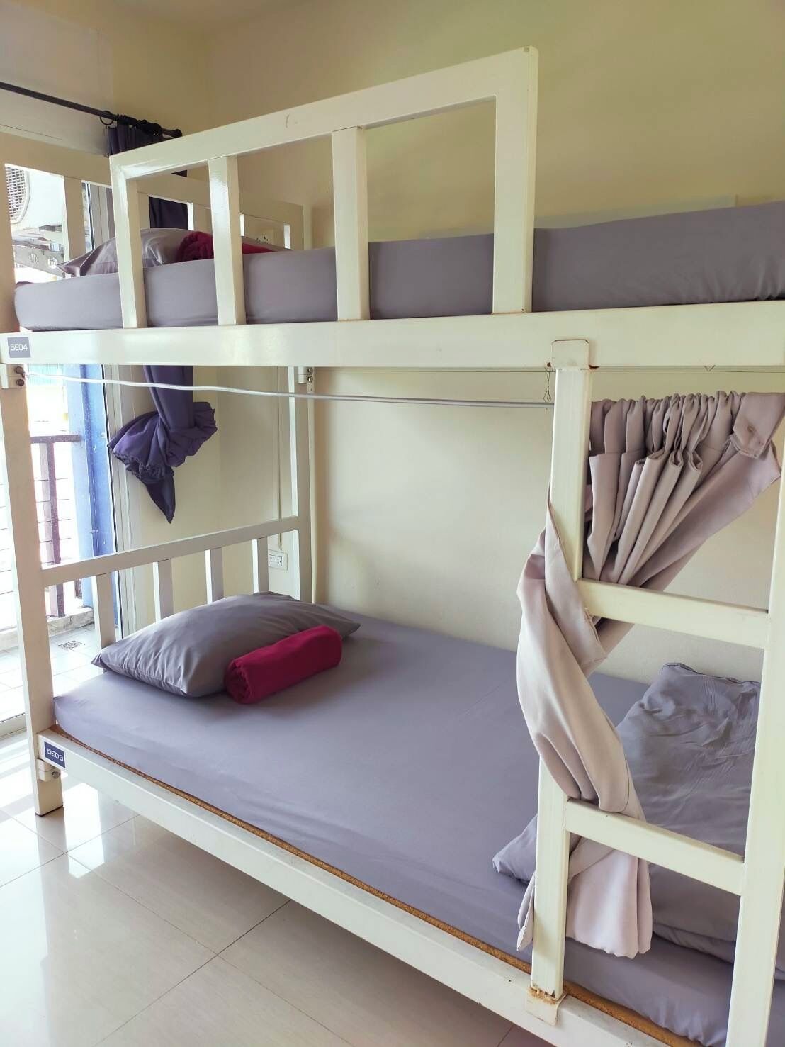 A bunk bed with a lower bunk and a top bunk.