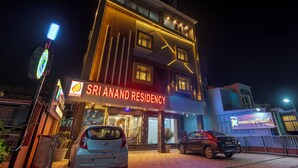A multi-story building with a prominent sign reading "Sri Anand Residency". - Treebo Sri Anand Residency (Chennai)