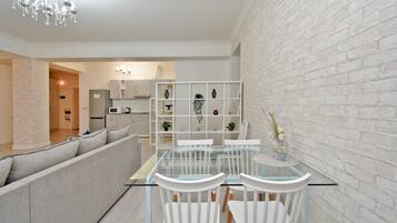 Deluxe-Apartment, Stadtblick | Wohnbereich