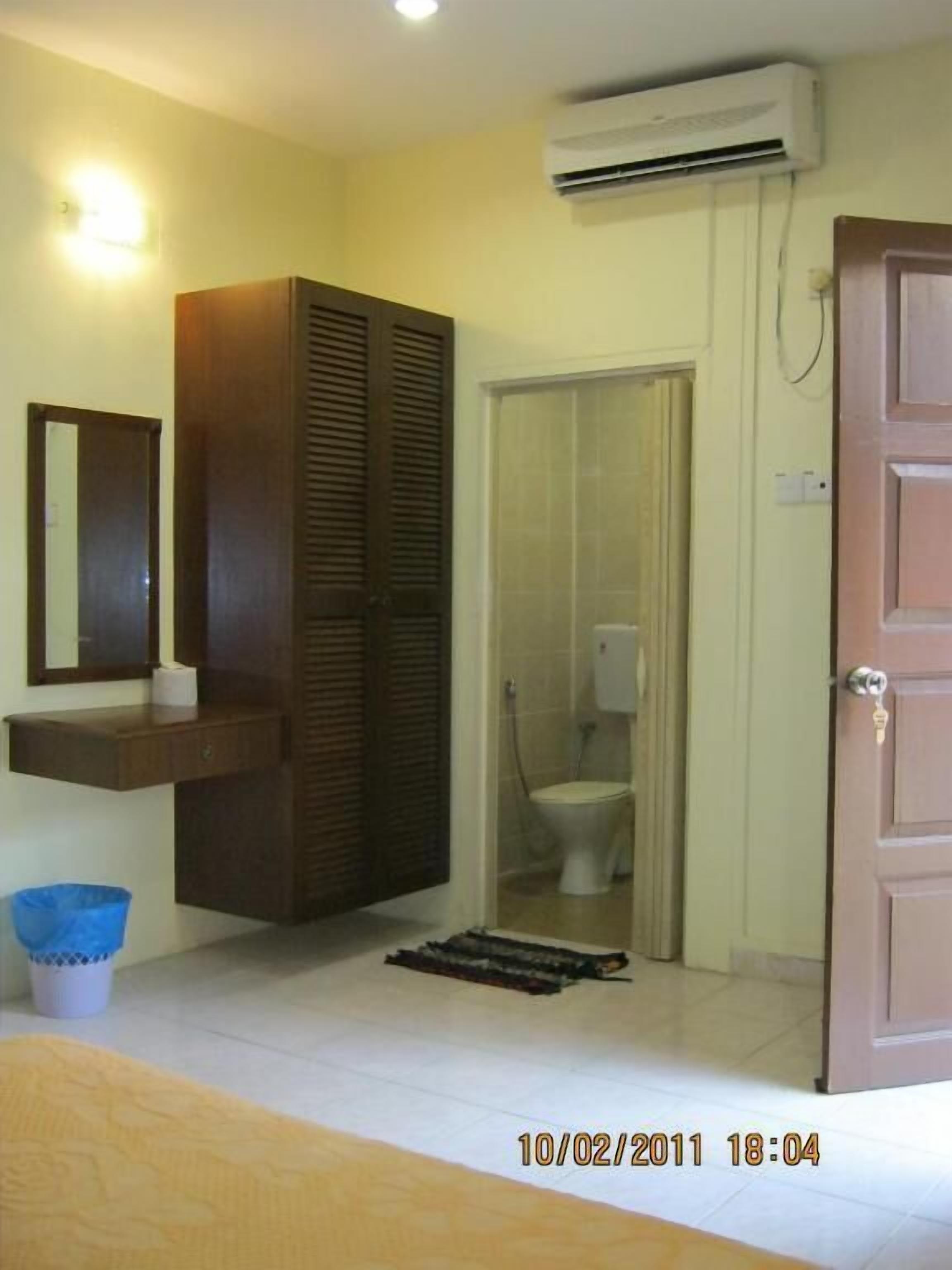 Shower, towels, soap, toilet paper