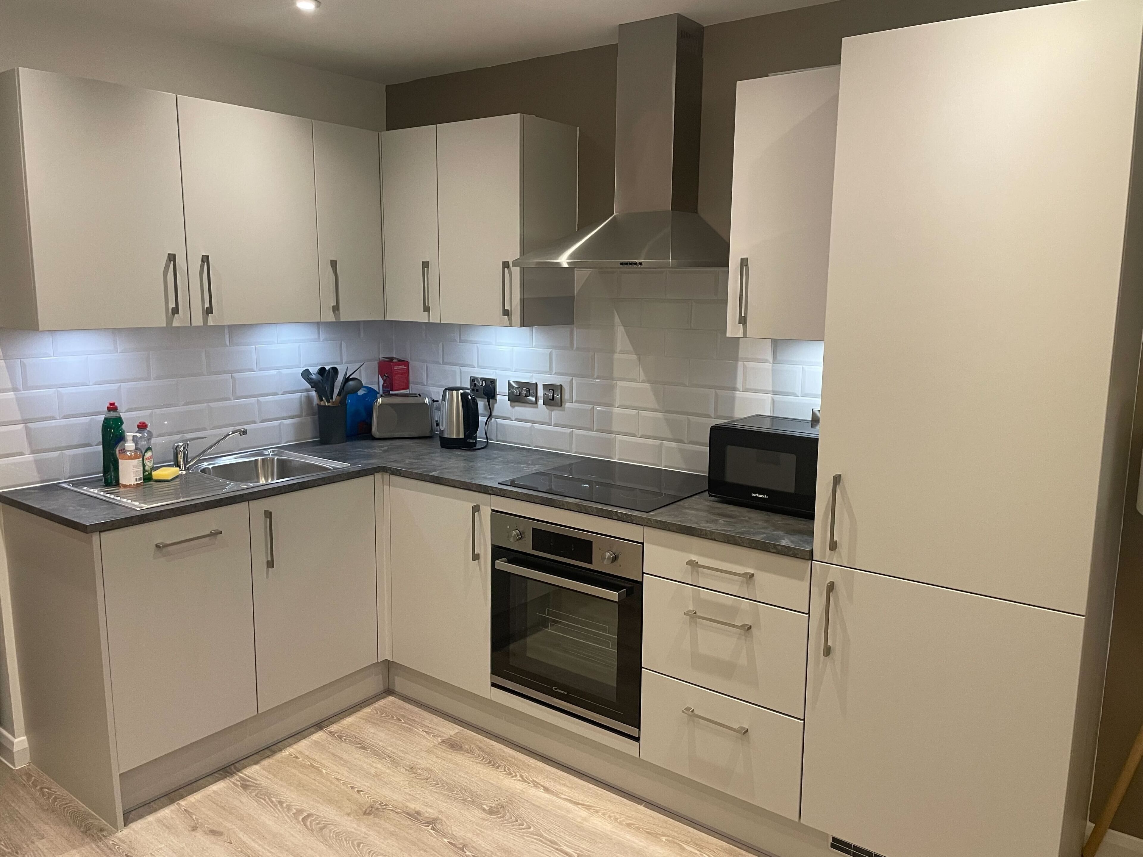 Apartment, Multiple Beds, Non Smoking | Private kitchen | Full-size fridge, microwave, oven, stovetop