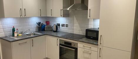 公寓, 多張床, 非吸煙房 | 私人廚房 | 大型冰箱、微波爐、烤箱、爐台