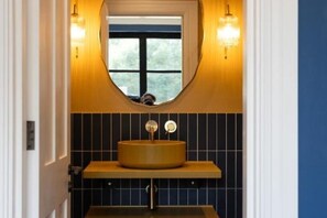 Shower, hair dryer, towels, toilet paper