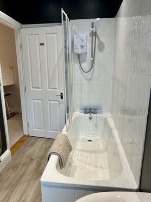 Hair dryer, towels, soap, shampoo