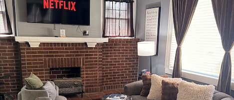 Smart TV, fireplace, video library