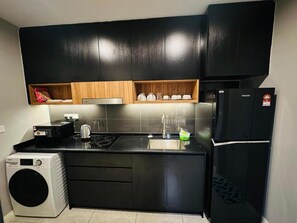 Apartamento luxo, 2 camas Queen, para não fumantes, vista para a cidade | Cozinha privada