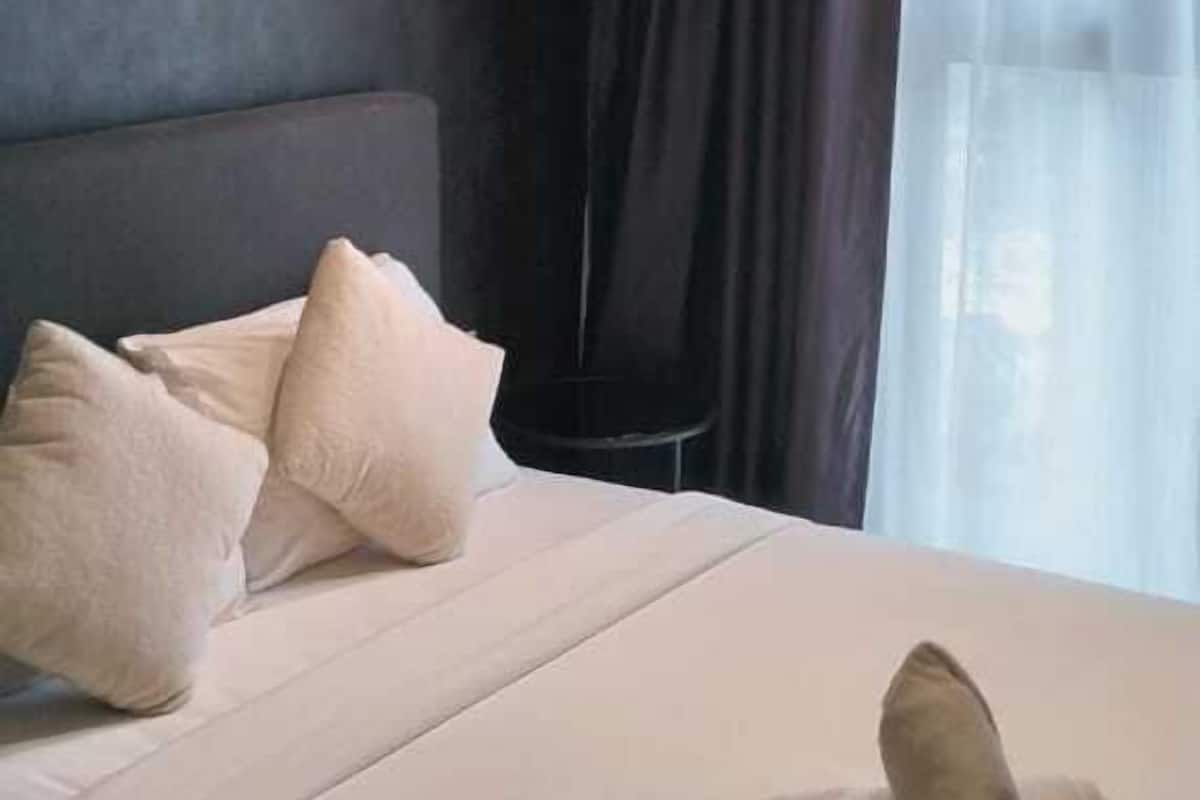 Family Apartment, 2 Bedrooms, City View | Iron/ironing board, free WiFi, bed sheets, wheelchair access