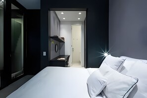 Appartement | Een kluis op de kamer, verduisterende gordijnen