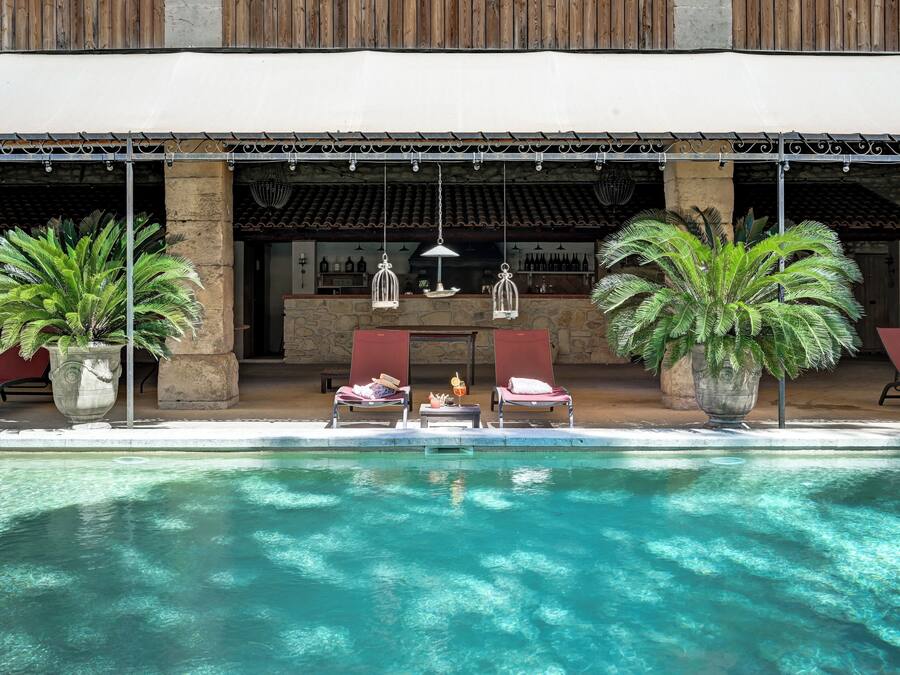 Seasonal outdoor pool, pool umbrellas, pool loungers