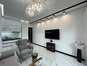 Departamento clásico, 2 habitaciones | Área de sala de estar