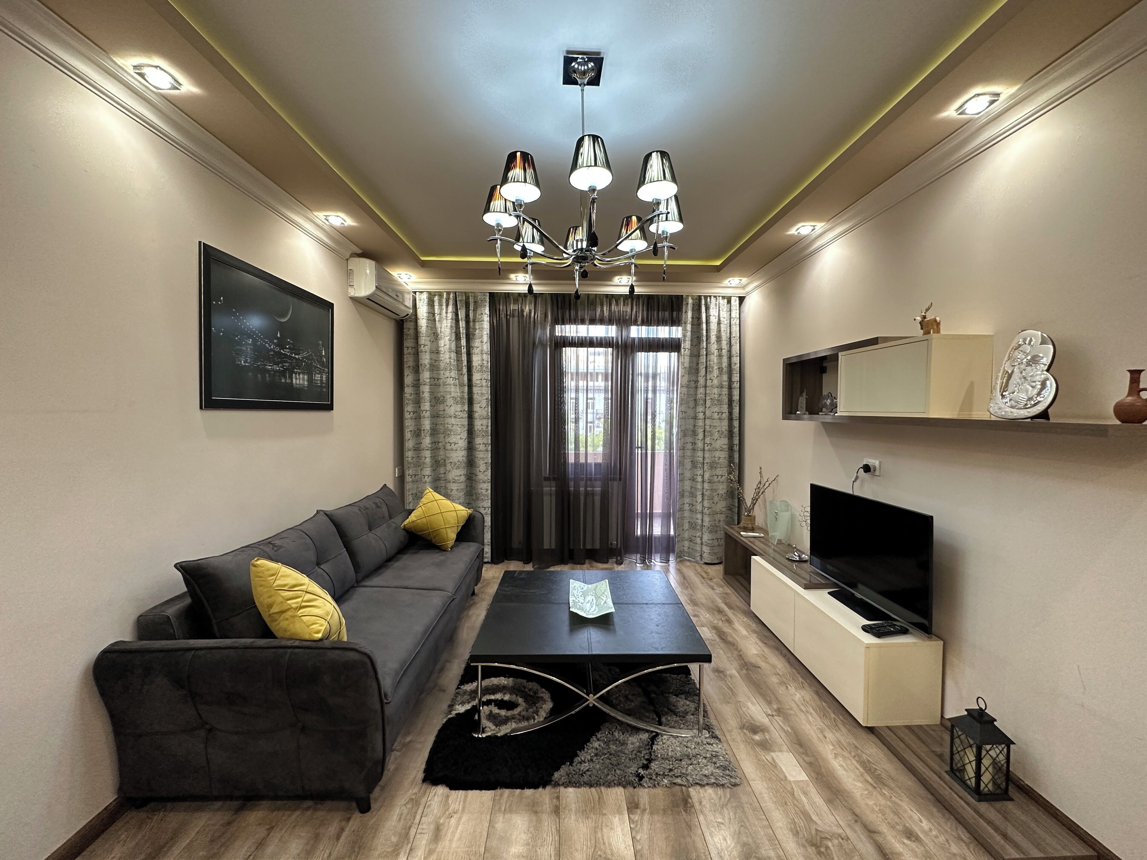 Comfort Apartment, 1 Bedroom, Balcony | Living area | 50-inch flat-screen TV with cable channels