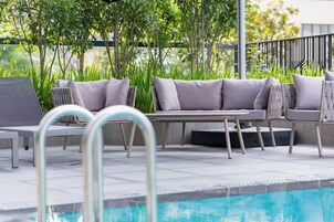 Outdoor pool, open 7:00 AM to 9:00 PM, sun loungers