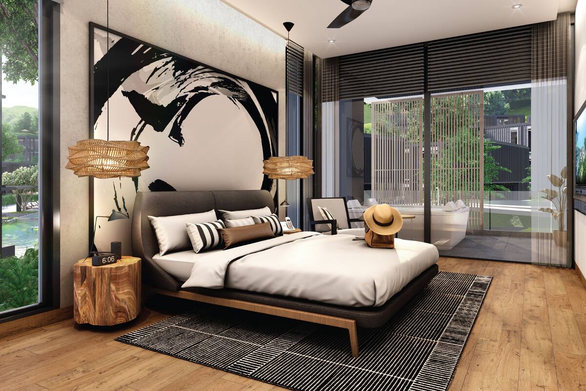 A modern bedroom with a large bed, a ceiling fan, and a view of the outdoors.