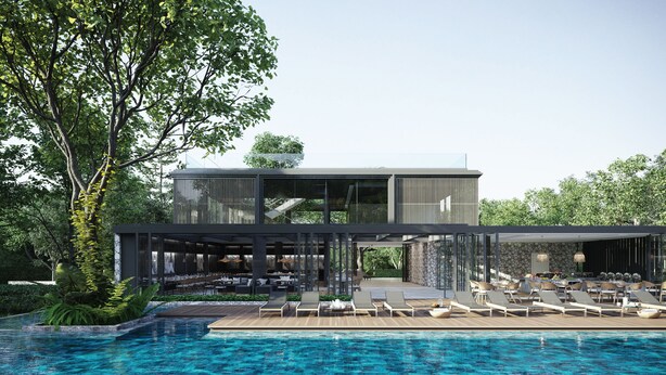 A modern resort with a pool, outdoor seating, and a stone wall. - Kamaliss MontAzure Phuket - MGallery Collection (Kamala)
