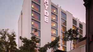 A multi-story hotel with a prominent neon sign reading 'HYDE' on the facade. - Hyde Perth (Perth)