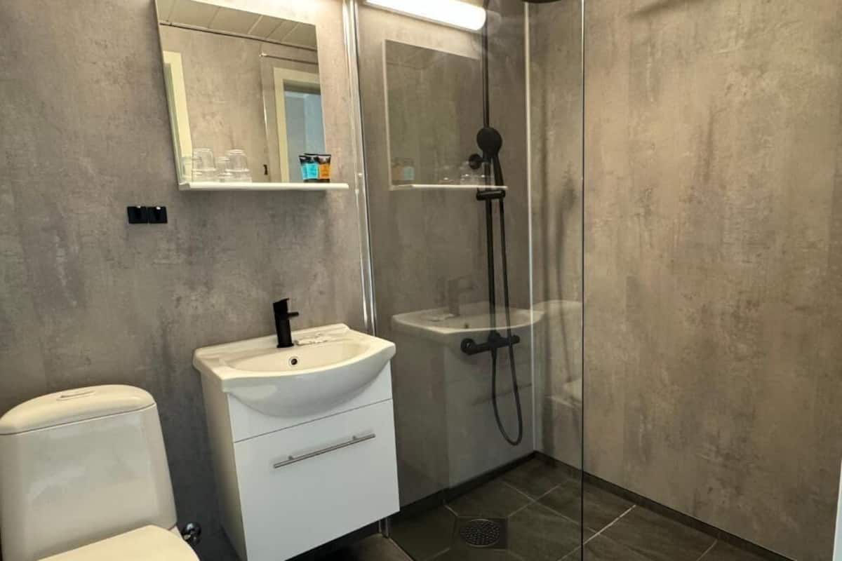 Camera tripla, vista mare parziale | Bagno