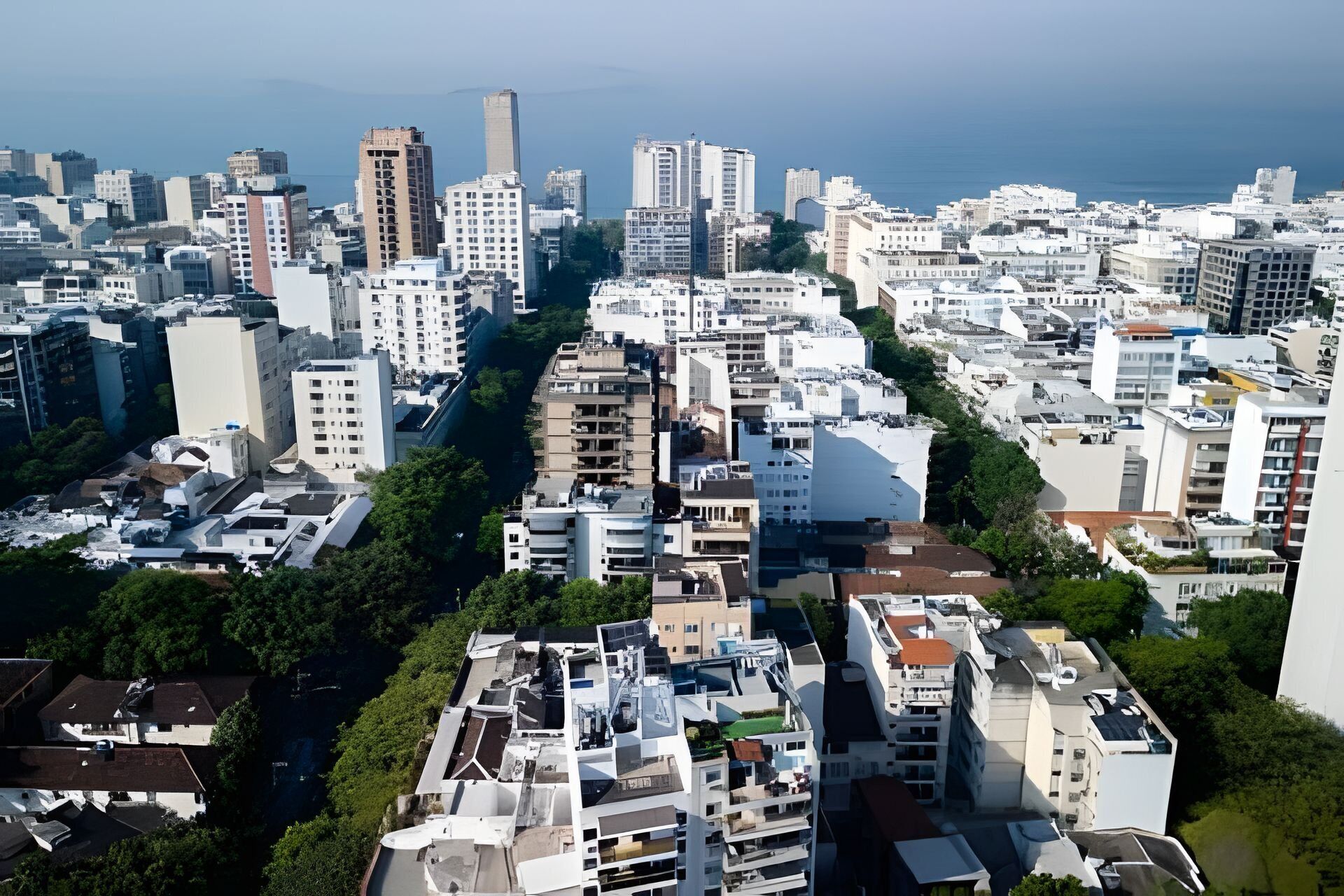 A densely packed urban area with a variety of building heights and architectural styles.
