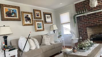 Smart TV, fireplace, DVD player, books