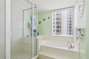 Shower, hair dryer, towels, shampoo