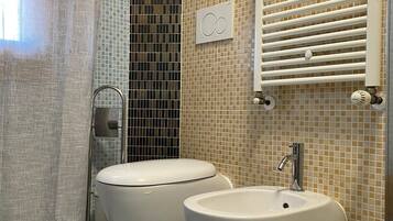 Shower, towels, soap, shampoo
