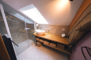 Shower, hair dryer, towels, toilet paper