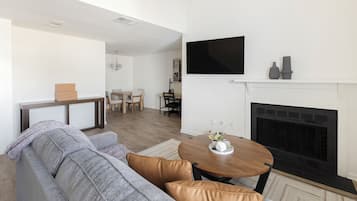 Apartment (1 Bedroom) | Living area | 50-inch TV with digital channels