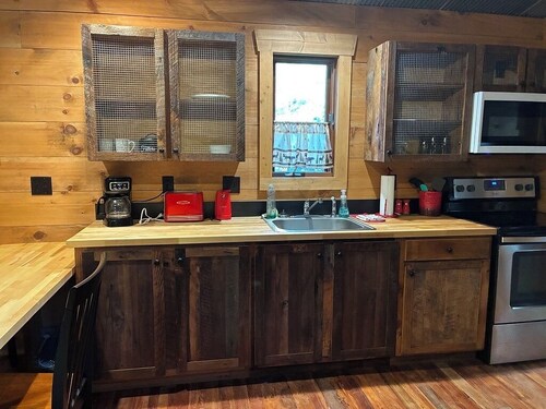 Visit this rustic cabin snuggled deep in the heart of the Shawnee Forest