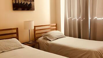 Blackout drapes, iron/ironing board, free WiFi