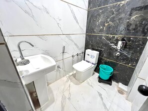 Deluxe Double Room, City View | Bathroom | Free toiletries, slippers, towels, soap