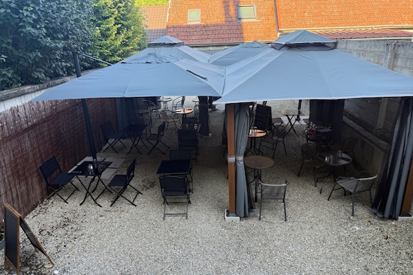 Triple Room, Garden View | Terrace/patio