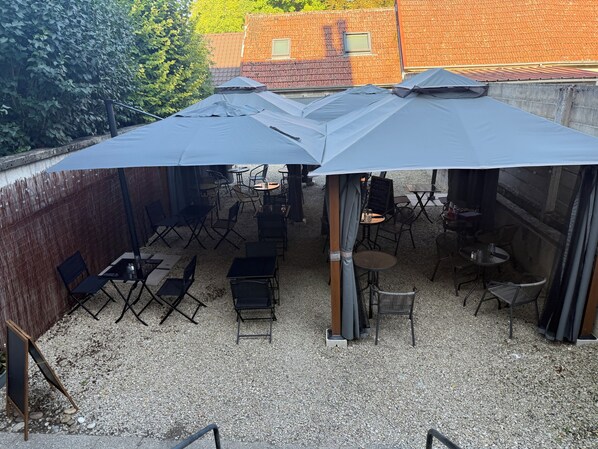 Triple Room, Garden View | Terrace/patio