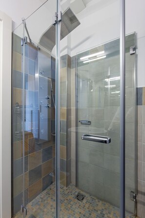 Shower, eco-friendly toiletries, hair dryer, bidet