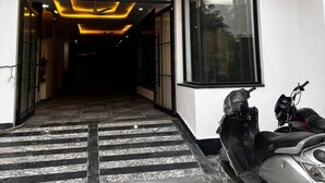 A building entrance with a sign reading "KAPIL ROYAL INN". - Hotel Kapil Royal Inn (Haridwar)