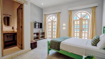 Deluxe Suite, Balcony, City View | In-room safe, free WiFi