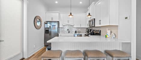 Signature House, 2 Bedrooms, Patio, Beachside | In-room dining