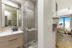 Shower, hair dryer, towels, soap