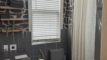 Hair dryer, towels, soap, toilet paper