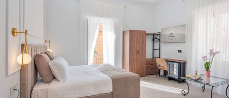 Superior Triple Room, Balcony | Down duvets, pillow-top beds, minibar, in-room safe