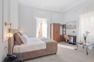 Superior Triple Room, Balcony | Down comforters, pillowtop beds, minibar, in-room safe