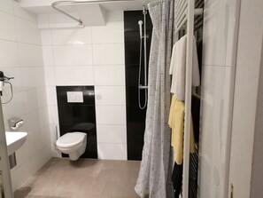 Hair dryer, towels, soap, toilet paper