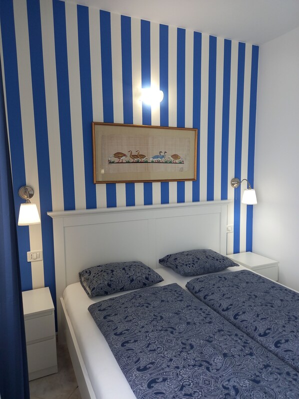 1 habitación, tabla de planchar con plancha, wifi y ropa de cama