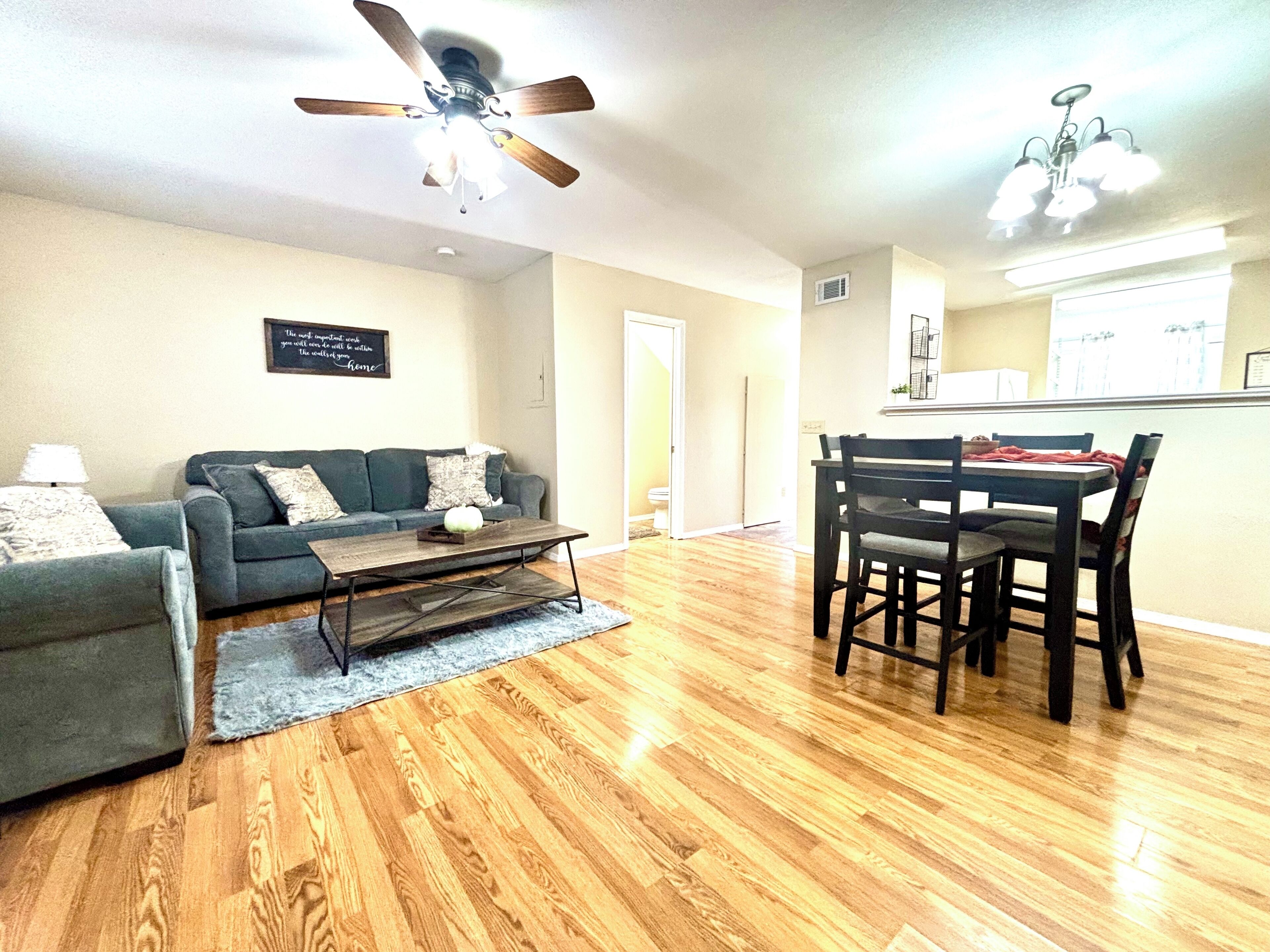 Living room with open concept dining.