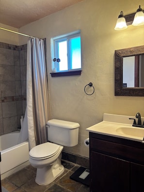 Hair dryer, towels, soap, toilet paper