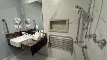 Hair dryer, towels, soap, shampoo