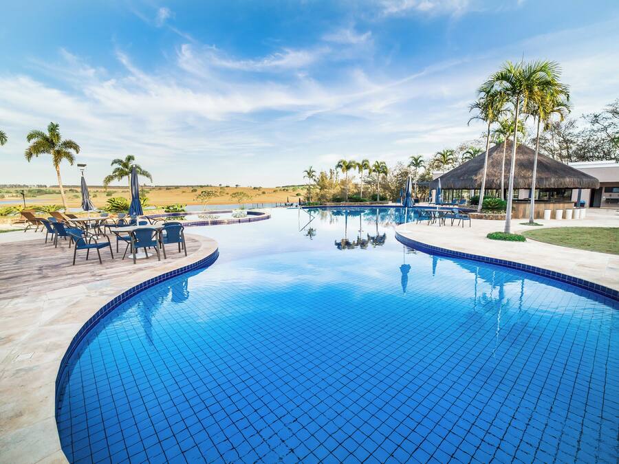 Outdoor pool, open 10:00 AM to 8:00 PM, pool umbrellas, sun loungers