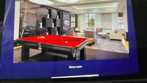 A game room with a pool table, a billiards table, and a foosball table. - Marriott Grand Chateau Charming 2-bedroom Villa-Las Vegas. (Las Vegas)