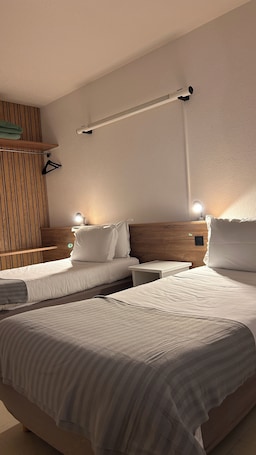 Wifi gratis y ropa de cama . Hôtel du Rocher
